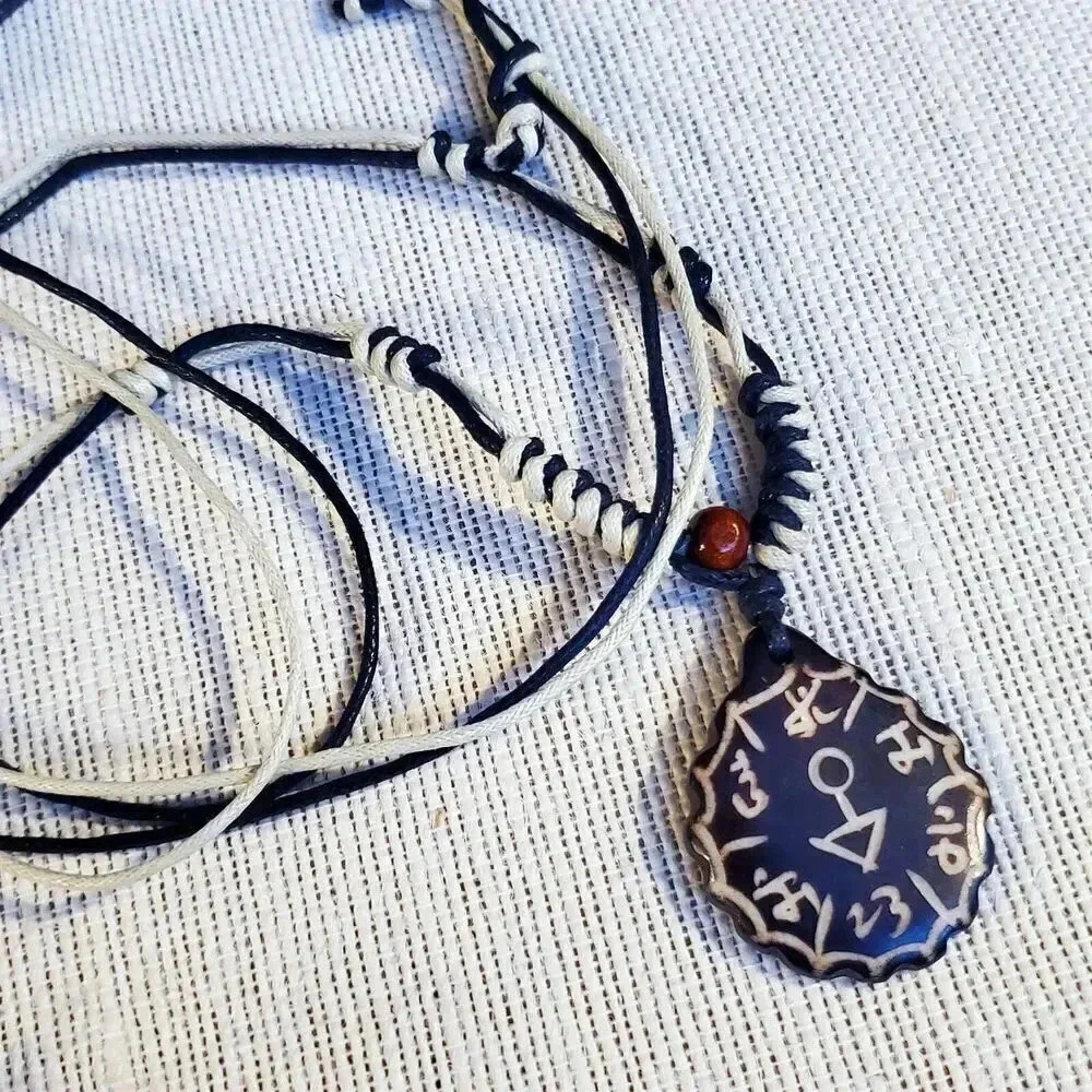 Hand Crafted Tribal Buffalo Bone Sanskrit Symbols Necklace from India